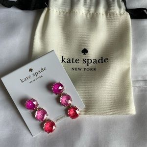 Pink gem post earrings.
